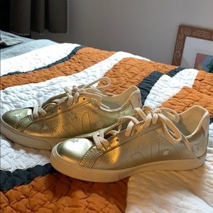 Veja gold sneakers with stars